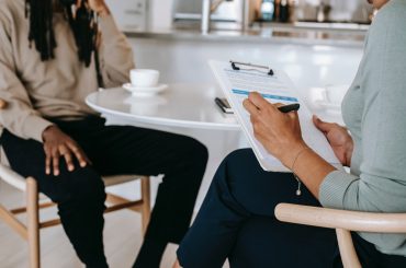 Teacher Being Consulted by Psychologist